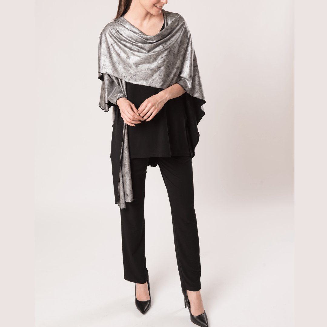 A stylish Shawl Platinum made of faux liquid leather, showcasing its reversible design and luxurious texture.