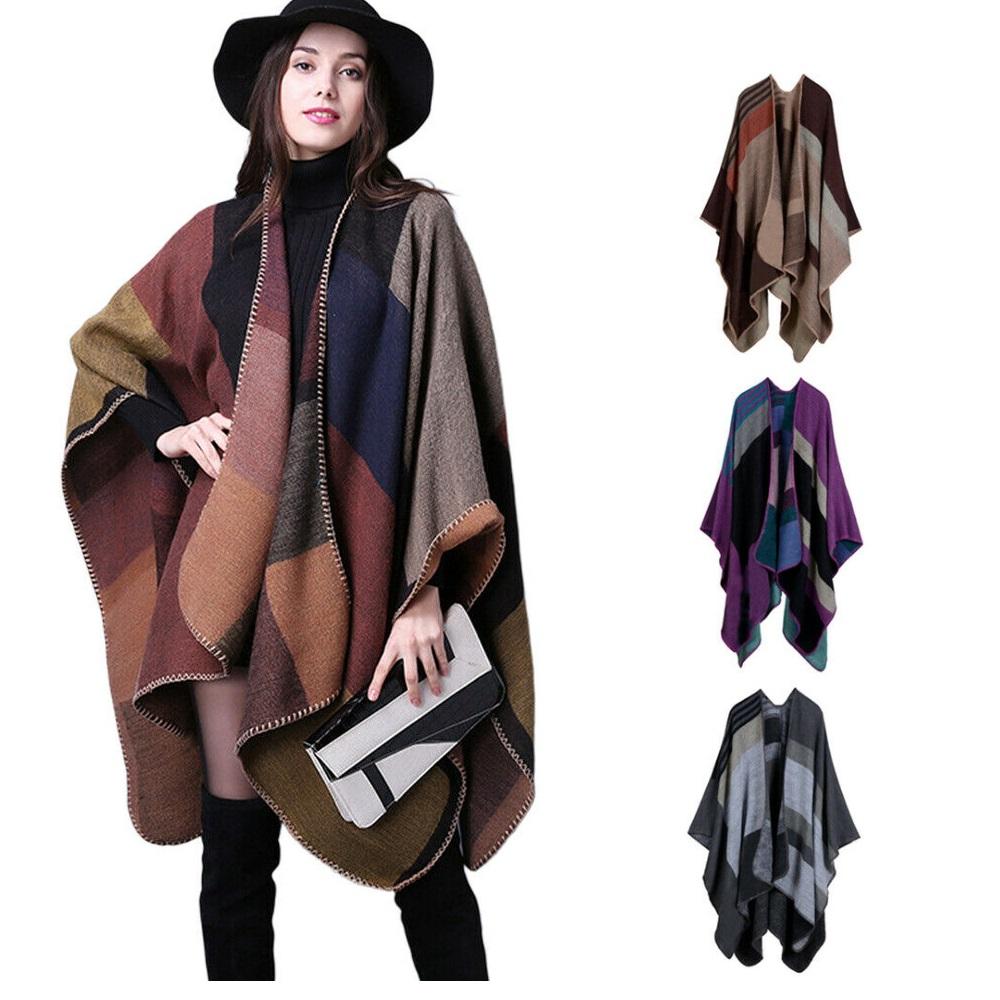 A stylish Shawl Wraps Sweater Poncho Cape Coat in khaki, showcasing its reversible design and elegant tassel details, perfect for winter wear.