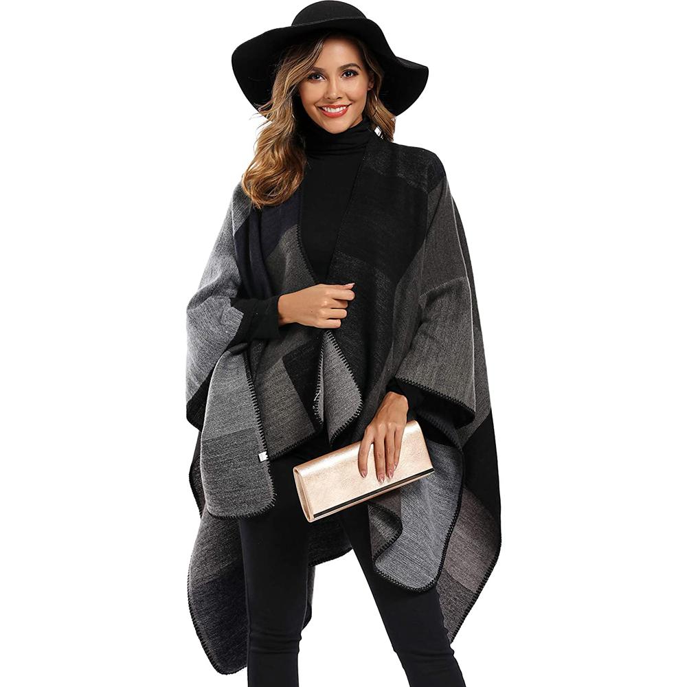 A stylish Shawl Wraps Sweater Poncho Cape Coat in khaki, showcasing its reversible design and elegant tassel details, perfect for winter wear.