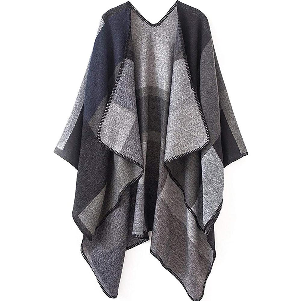 A stylish Shawl Wraps Sweater Poncho Cape Coat in khaki, showcasing its reversible design and elegant tassel details, perfect for winter wear.