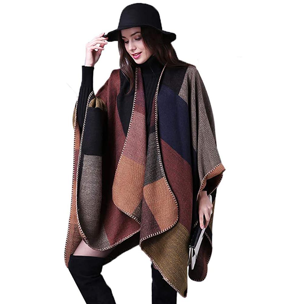 A stylish Shawl Wraps Sweater Poncho Cape Coat in khaki, showcasing its reversible design and elegant tassel details, perfect for winter wear.