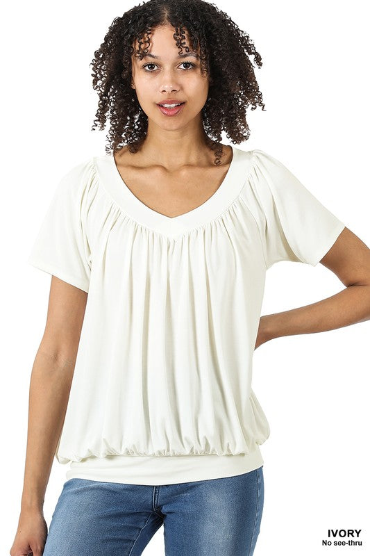 A stylish Shirred V-neck Short Sleeve Top featuring a pleated design and fitted elastic waistband, available in various colors.