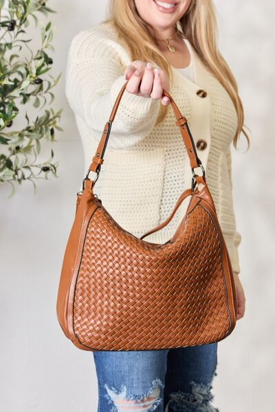 SHOMICO Weaved Vegan Leather Handbag showcasing intricate weaving and a stylish crossbody strap.