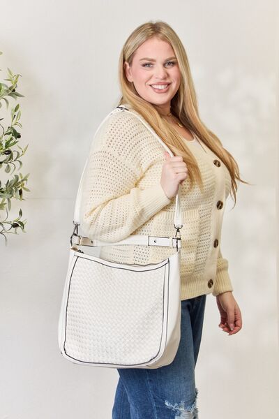 SHOMICO Weaved Vegan Leather Handbag showcasing intricate weaving and a stylish crossbody strap.