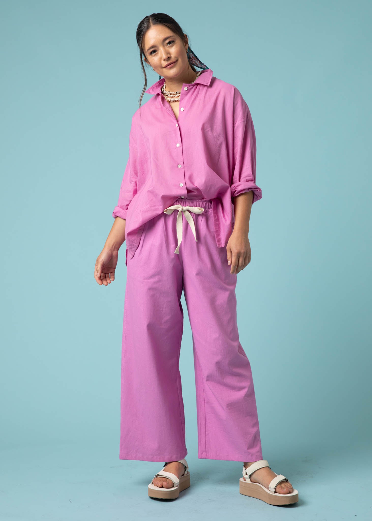 Shore Pant in Dahlia featuring a modern cropped length, relaxed fit, and elastic waist, made from organic cotton twill.