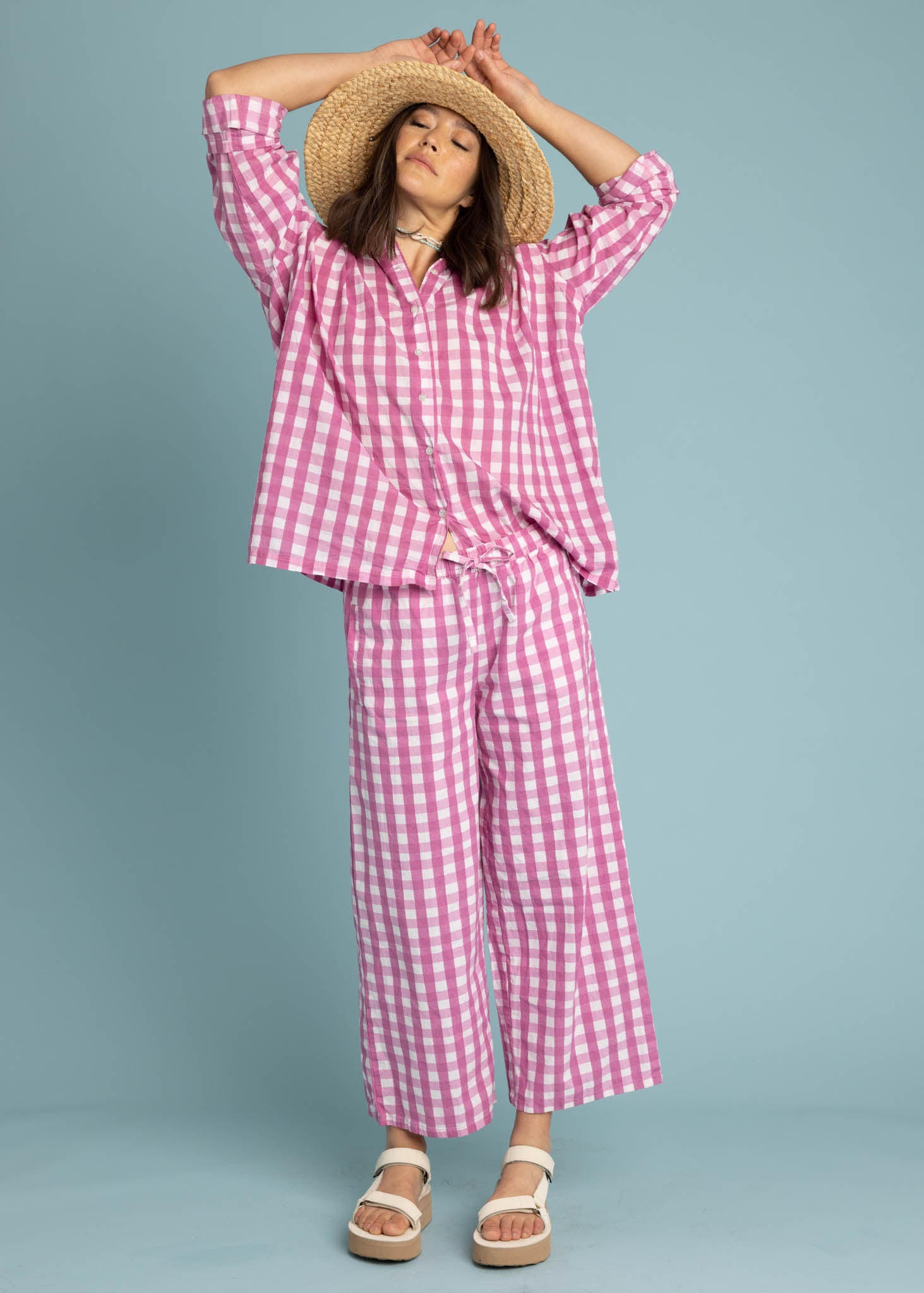 Shore Pant in Gingham Picnic Dahlia featuring a modern cropped length and relaxed fit, made from organic cotton.