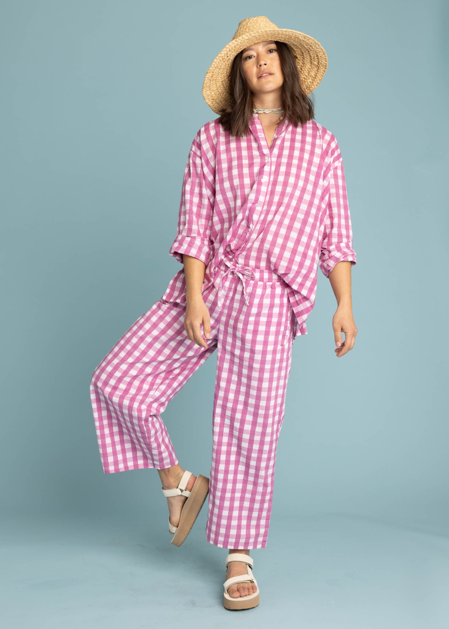 Shore Pant in Gingham Picnic Dahlia featuring a modern cropped length and relaxed fit, made from organic cotton.