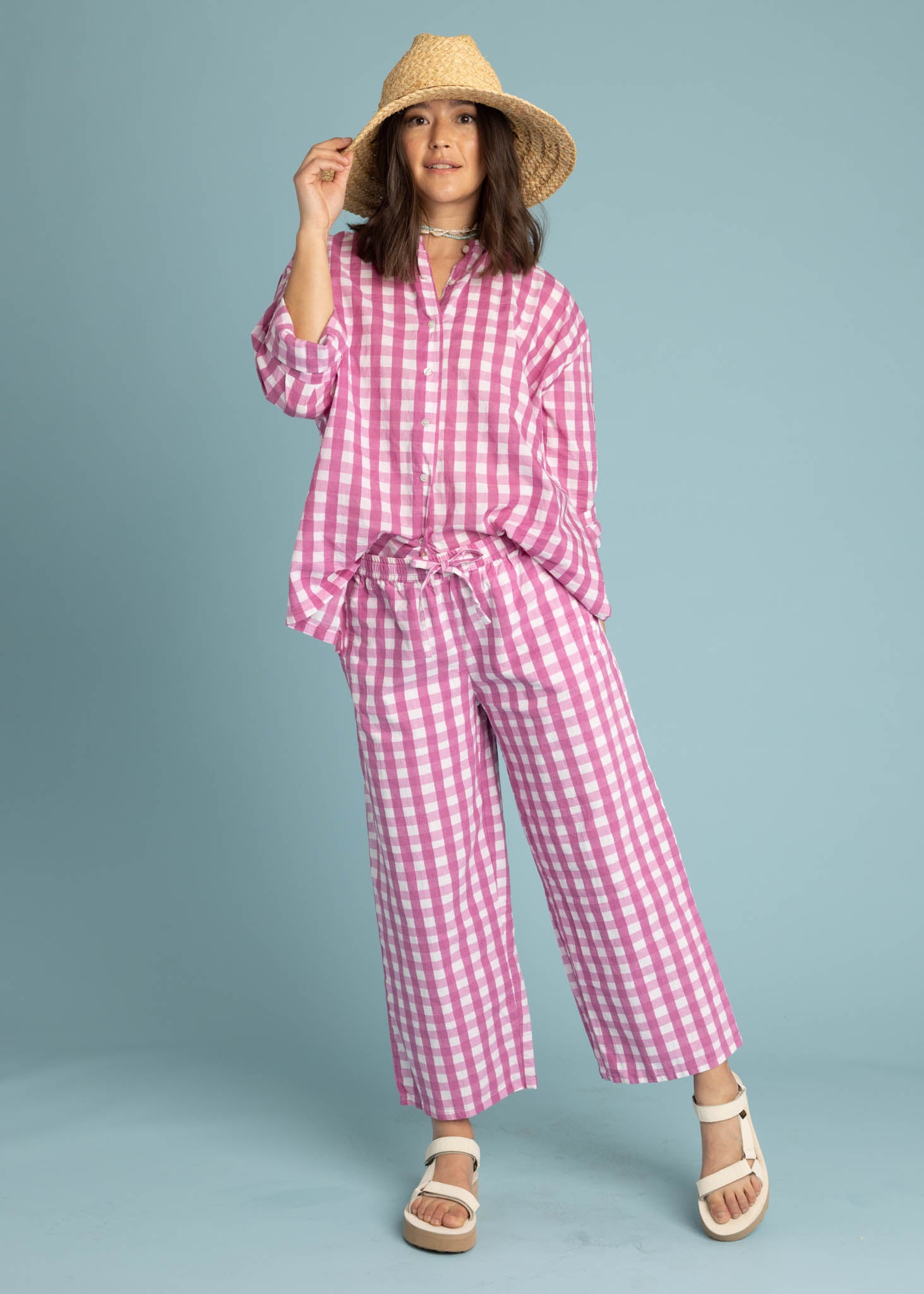 Shore Pant in Gingham Picnic Dahlia featuring a modern cropped length and relaxed fit, made from organic cotton.