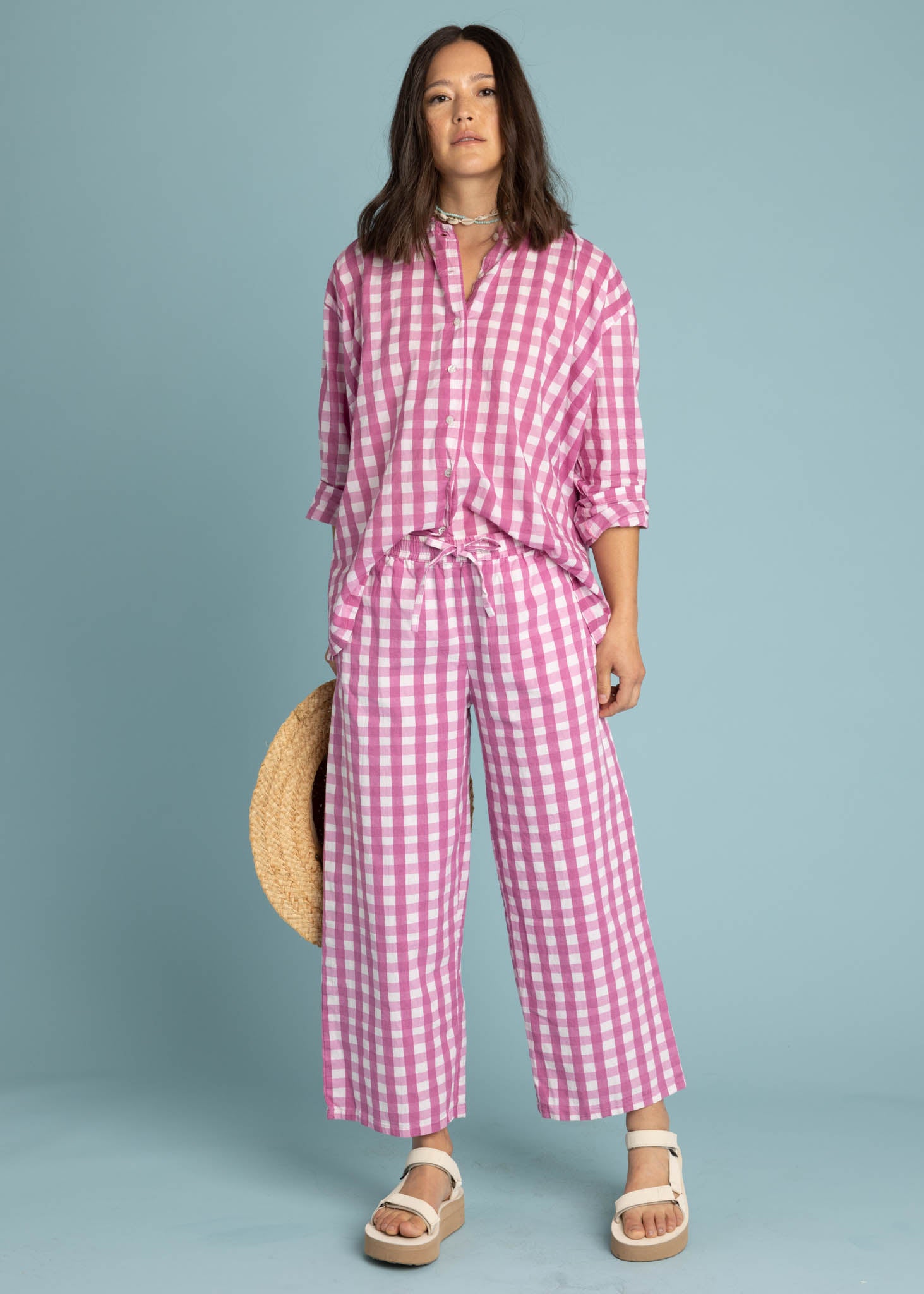 Shore Pant in Gingham Picnic Dahlia featuring a modern cropped length and relaxed fit, made from organic cotton.