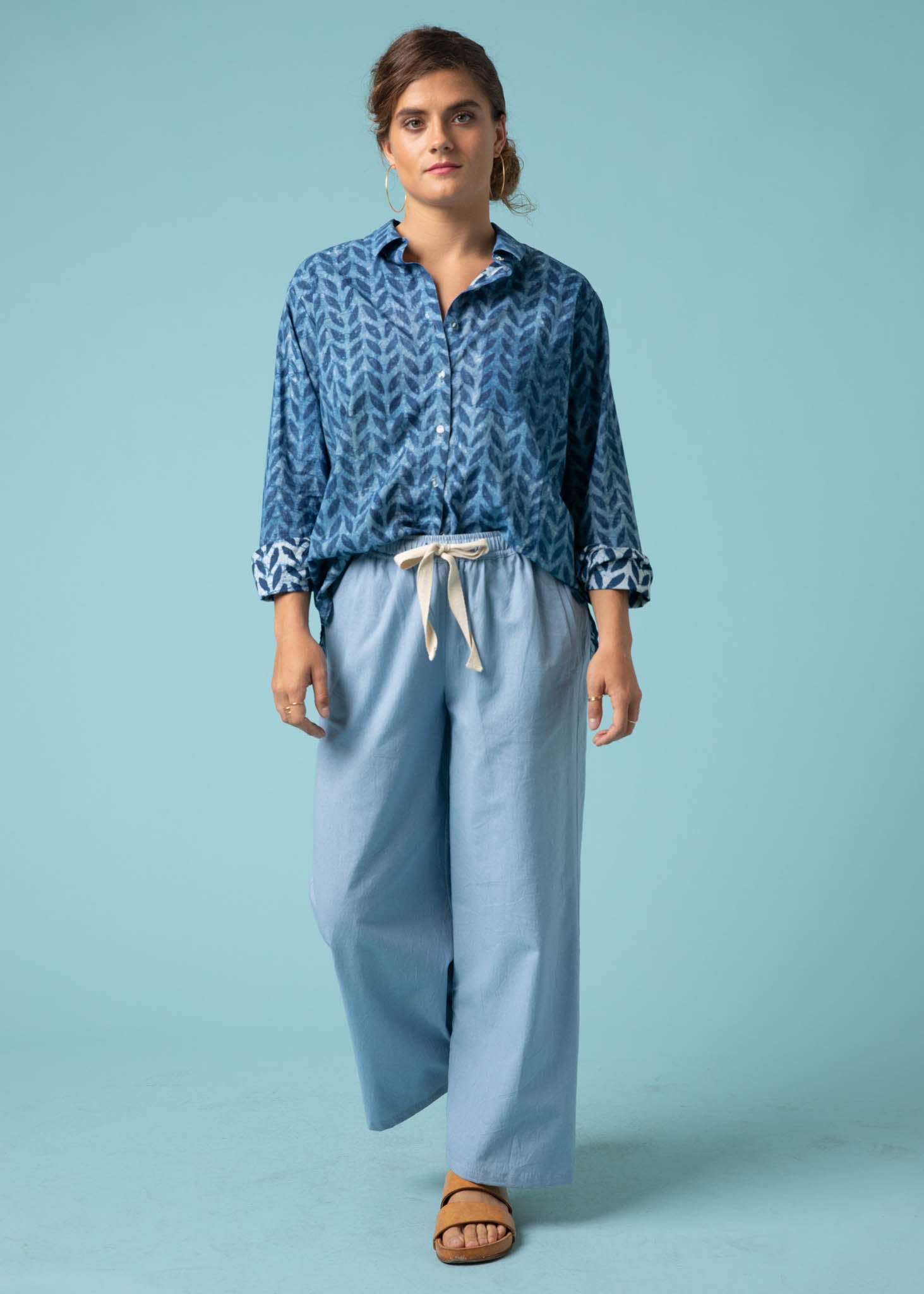 Shore Pant in Sky, featuring a modern cropped length, relaxed fit, and elastic waist, made from organic cotton twill.