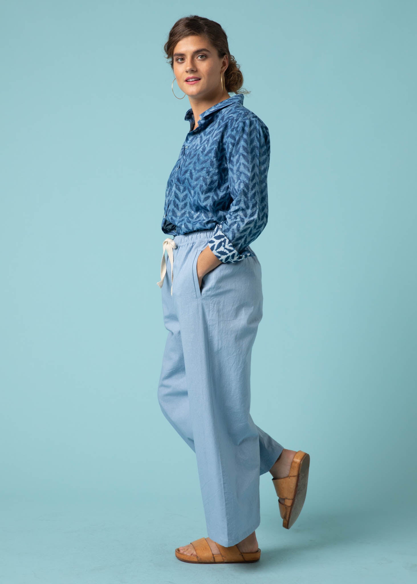 Shore Pant in Sky, featuring a modern cropped length, relaxed fit, and elastic waist, made from organic cotton twill.