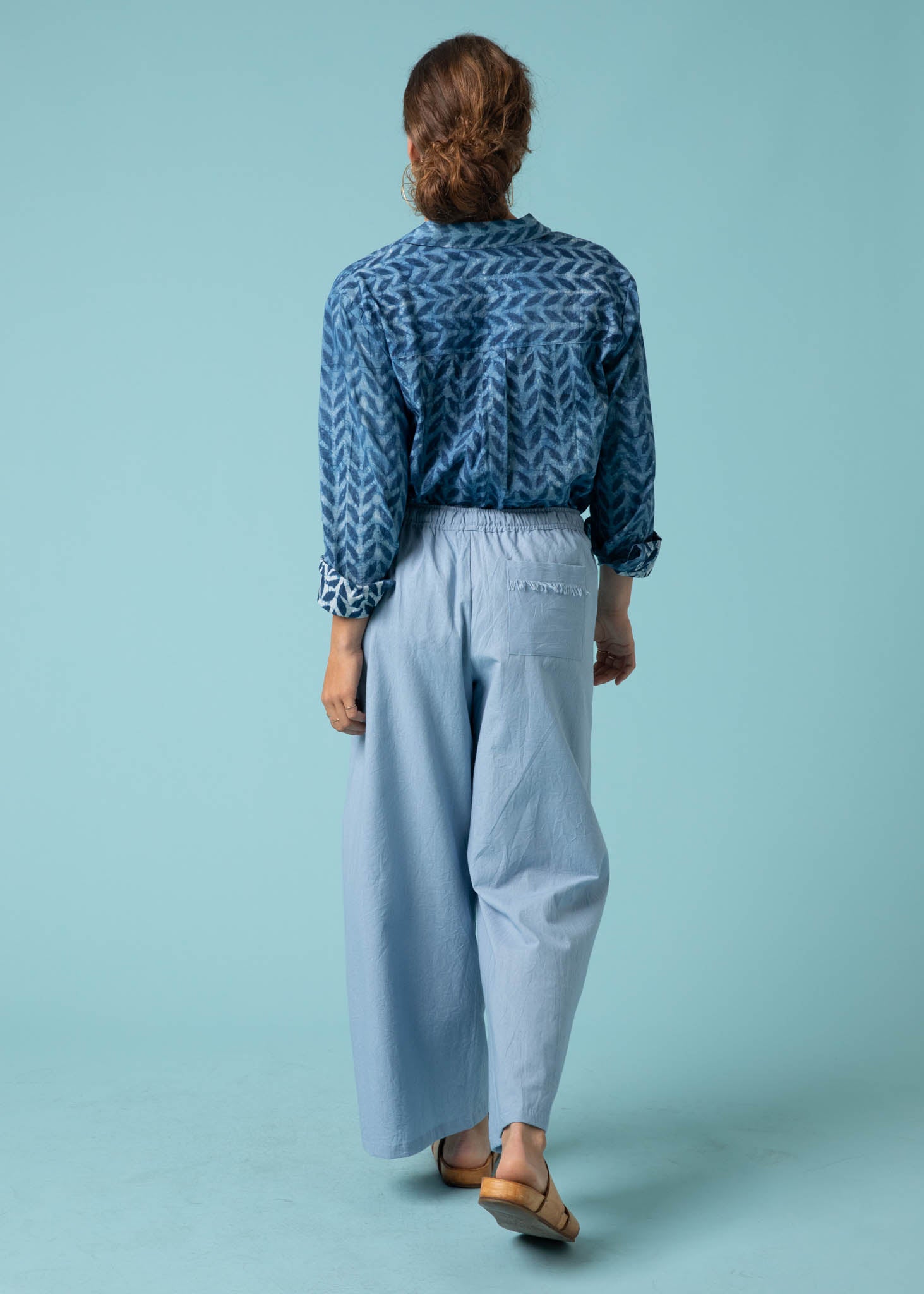 Shore Pant in Sky, featuring a modern cropped length, relaxed fit, and elastic waist, made from organic cotton twill.