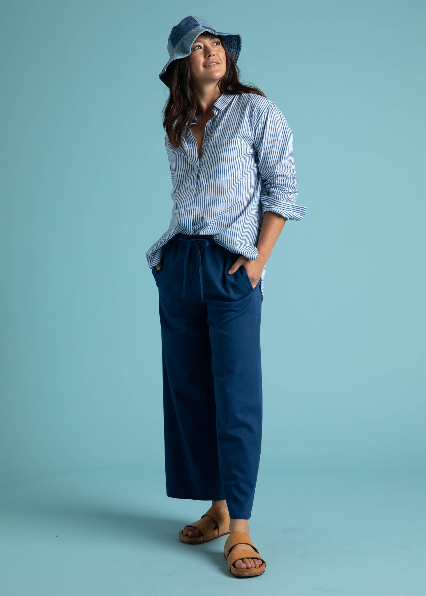 Shore Pant in True Navy featuring a relaxed fit, cropped length, and elastic waist, displayed on a model.