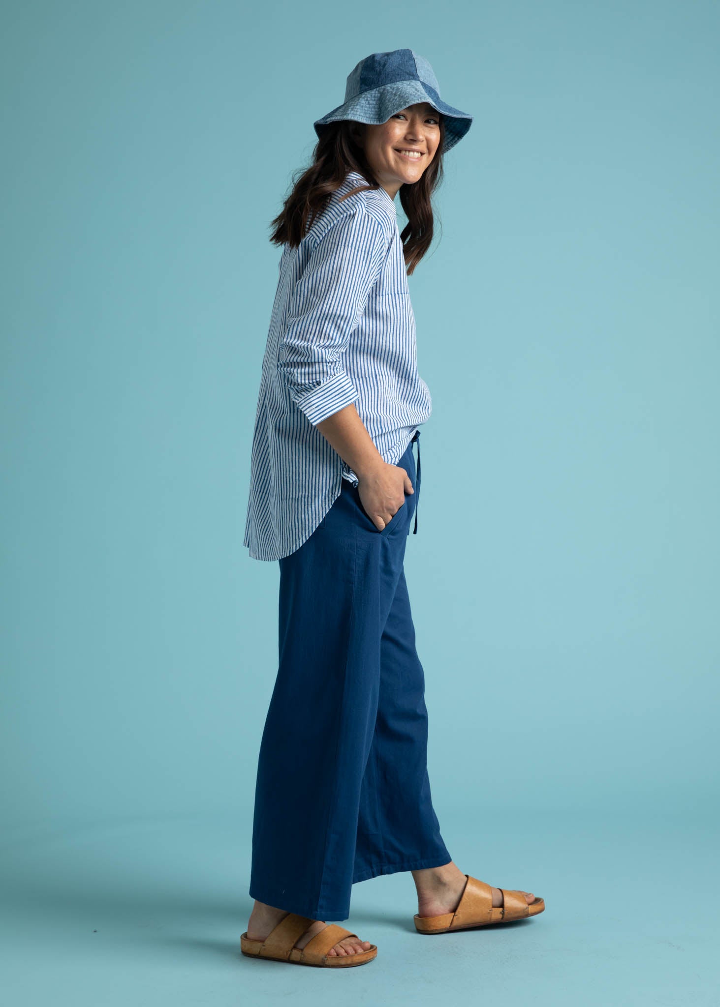 Shore Pant in True Navy featuring a relaxed fit, cropped length, and elastic waist, displayed on a model.