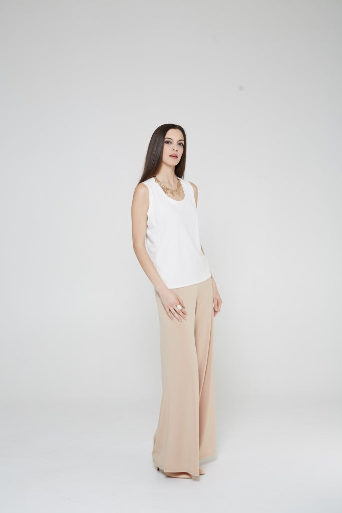 A stylish scoop neck short tank top in various colors, featuring wider shoulder straps and a soft fabric that drapes elegantly.