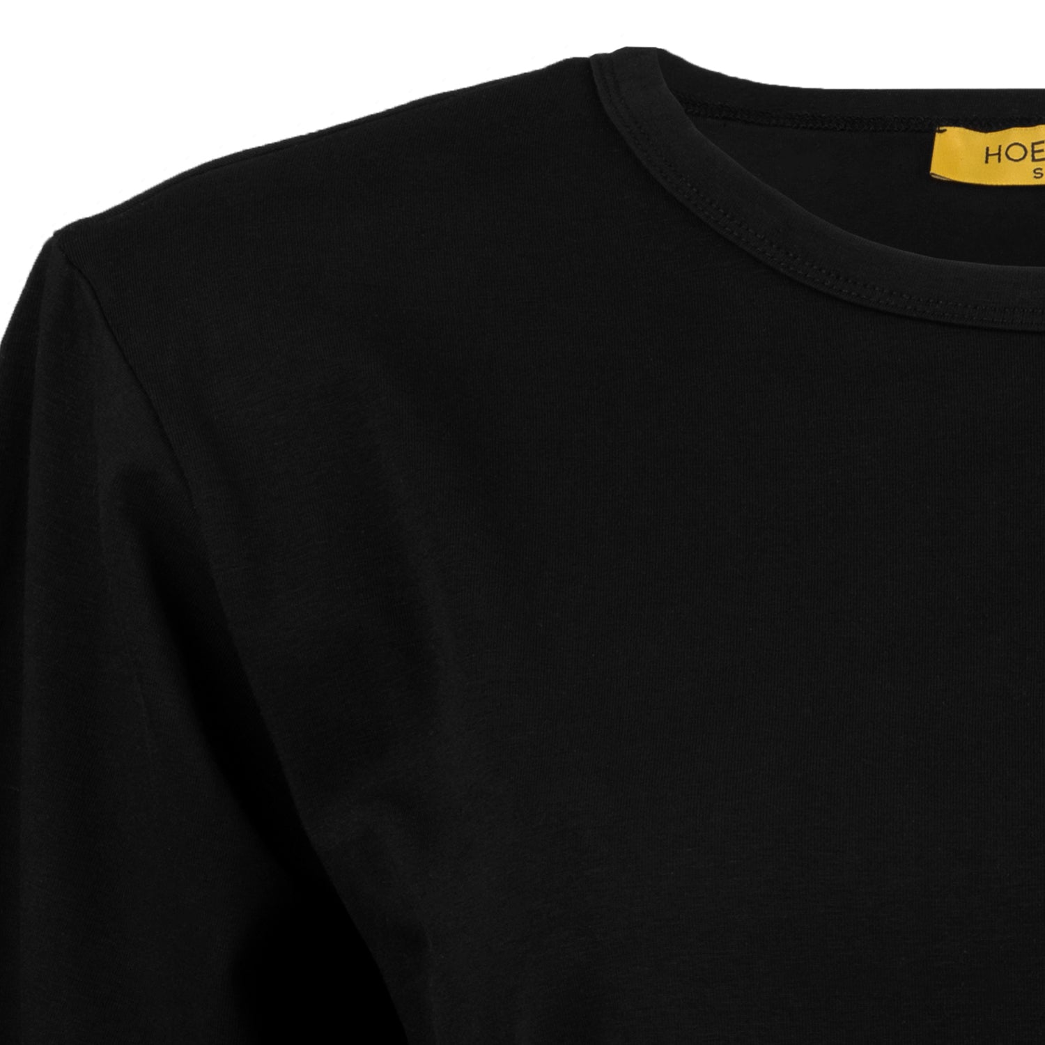 Black Shoulder Pad T-shirt displayed on a model, showcasing its elegant design and comfortable fit.