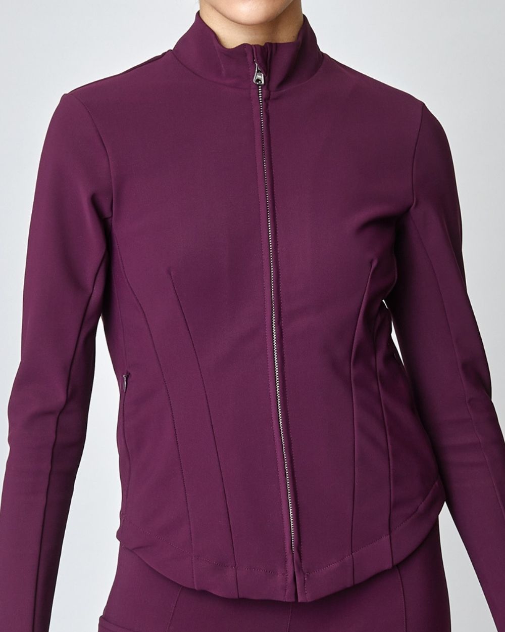 Burgundy Signature Riding Jacket made from Italian jersey fiber, featuring a fitted silhouette and concealed pockets.