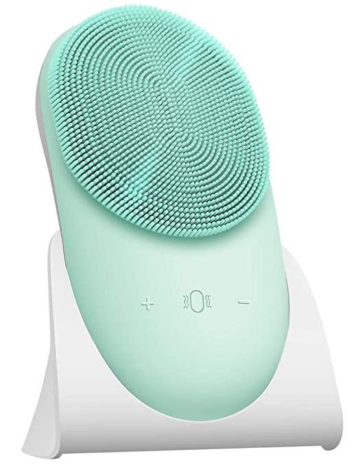 Silicone Facial Scrubber with soft bristles and metal thermal massage back, designed for deep cleansing and skin rejuvenation.