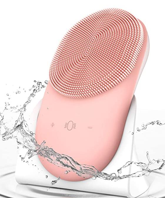 Silicone Facial Scrubber with soft bristles and metal thermal massage back, designed for deep cleansing and skin rejuvenation.