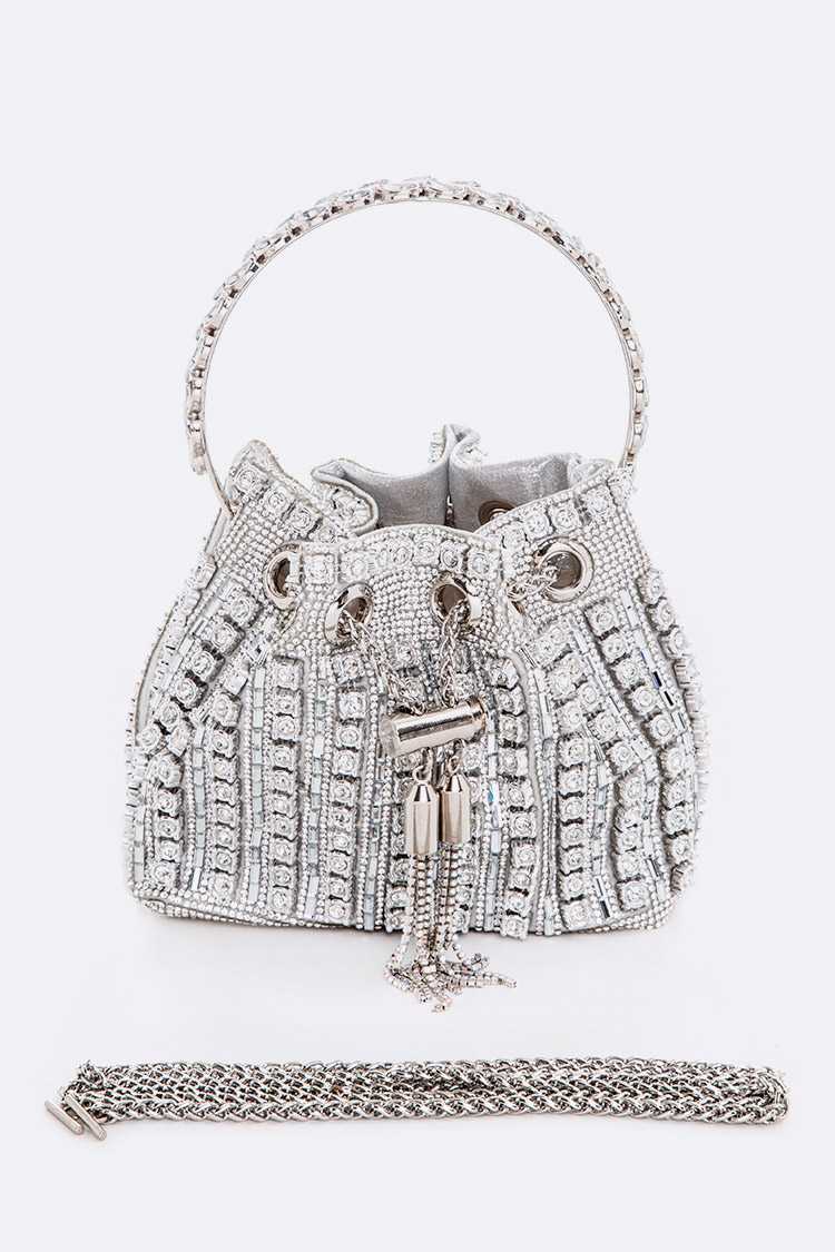 Stylish Silver Fire Bag with shoulder chain and drawstring closure, perfect for various occasions.