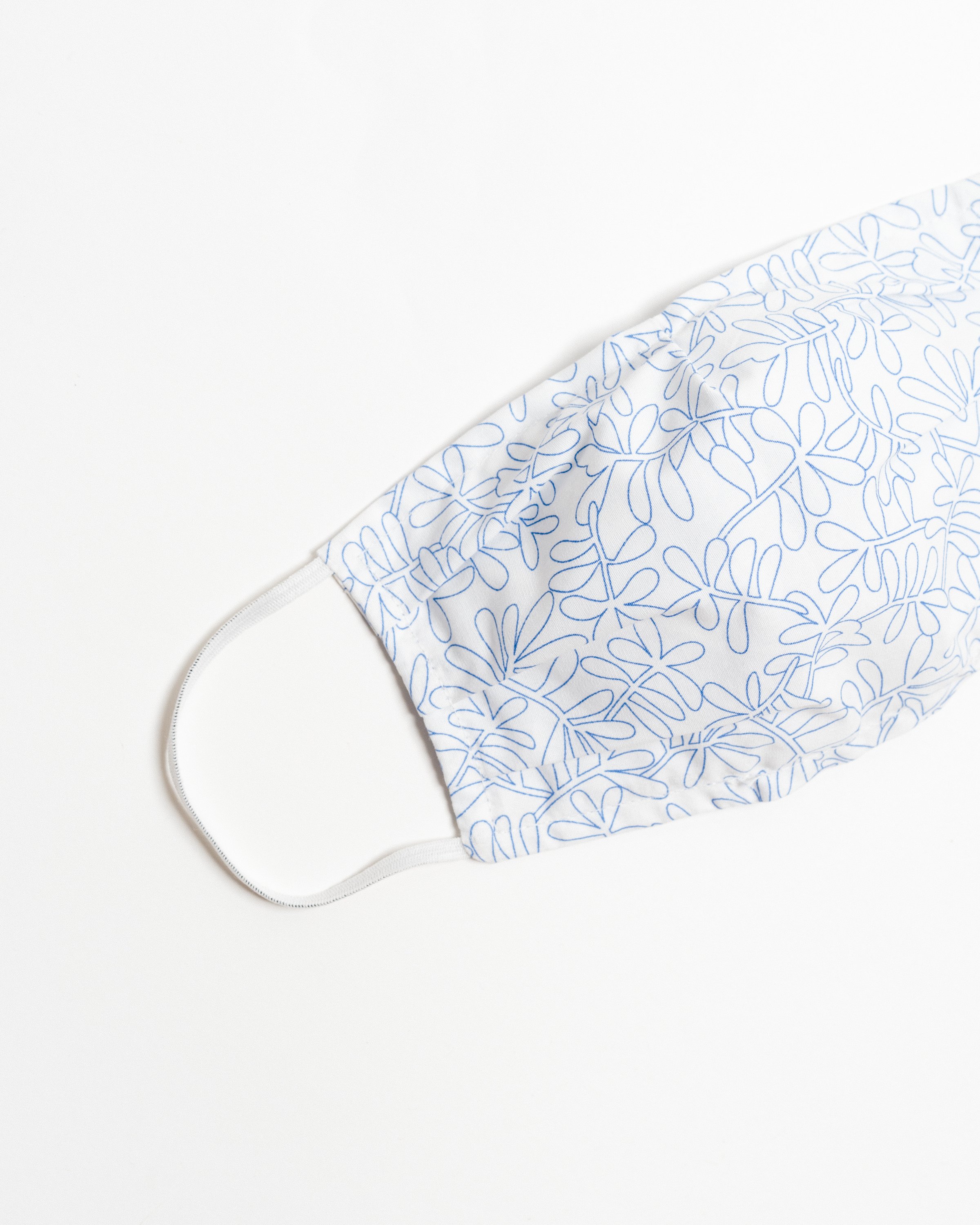 Silverlake Face Mask made of breathable cotton with pleats for comfort, featuring a pocket for filters and elastic ear straps.