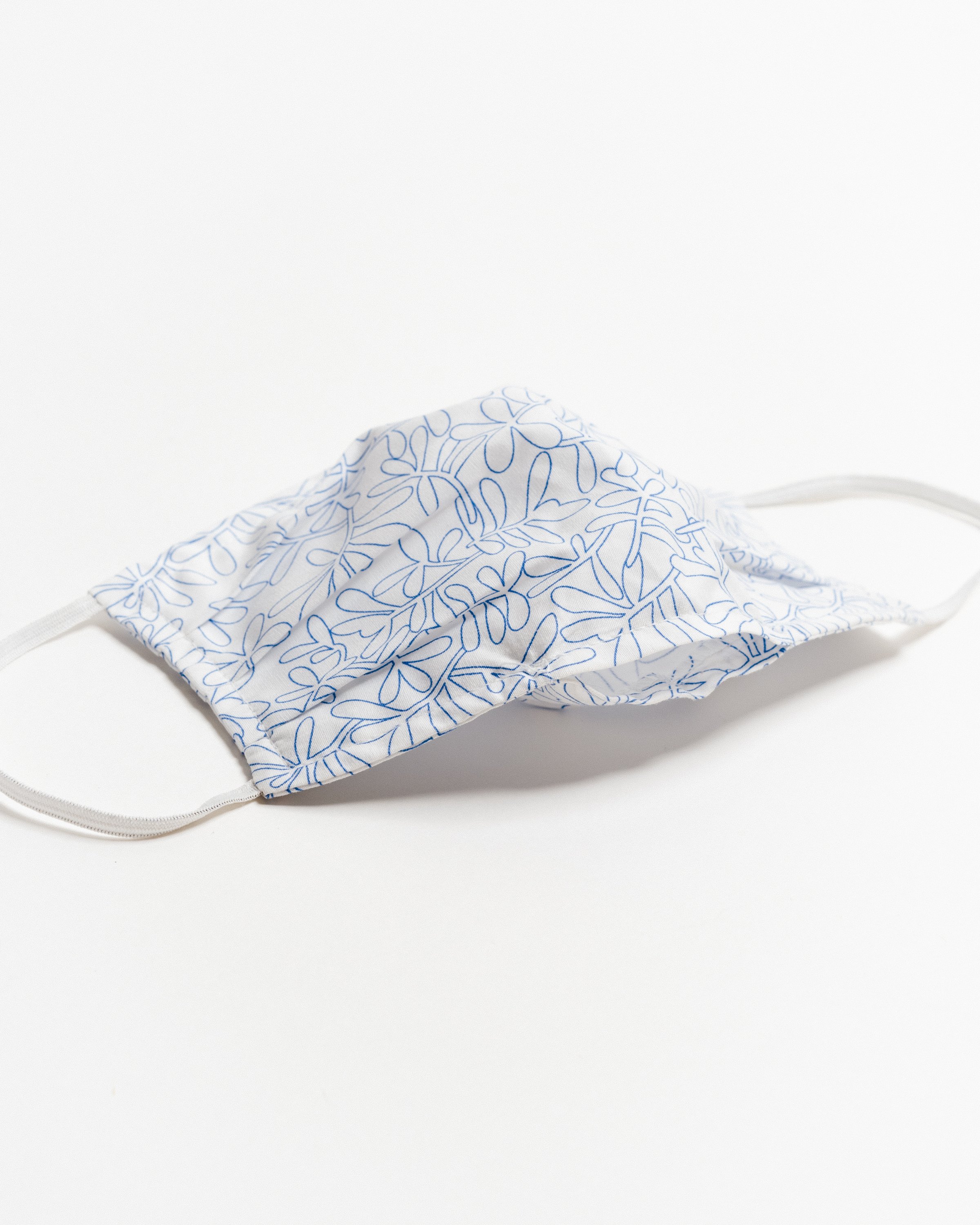 Silverlake Face Mask made of breathable cotton with pleats for comfort, featuring a pocket for filters and elastic ear straps.