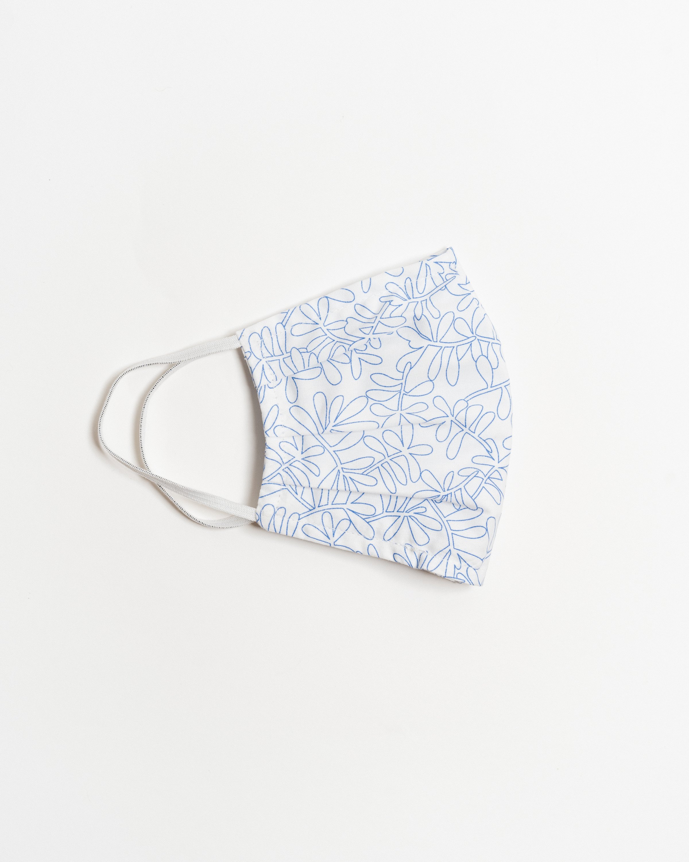 Silverlake Face Mask made of breathable cotton with pleats for comfort, featuring a pocket for filters and elastic ear straps.