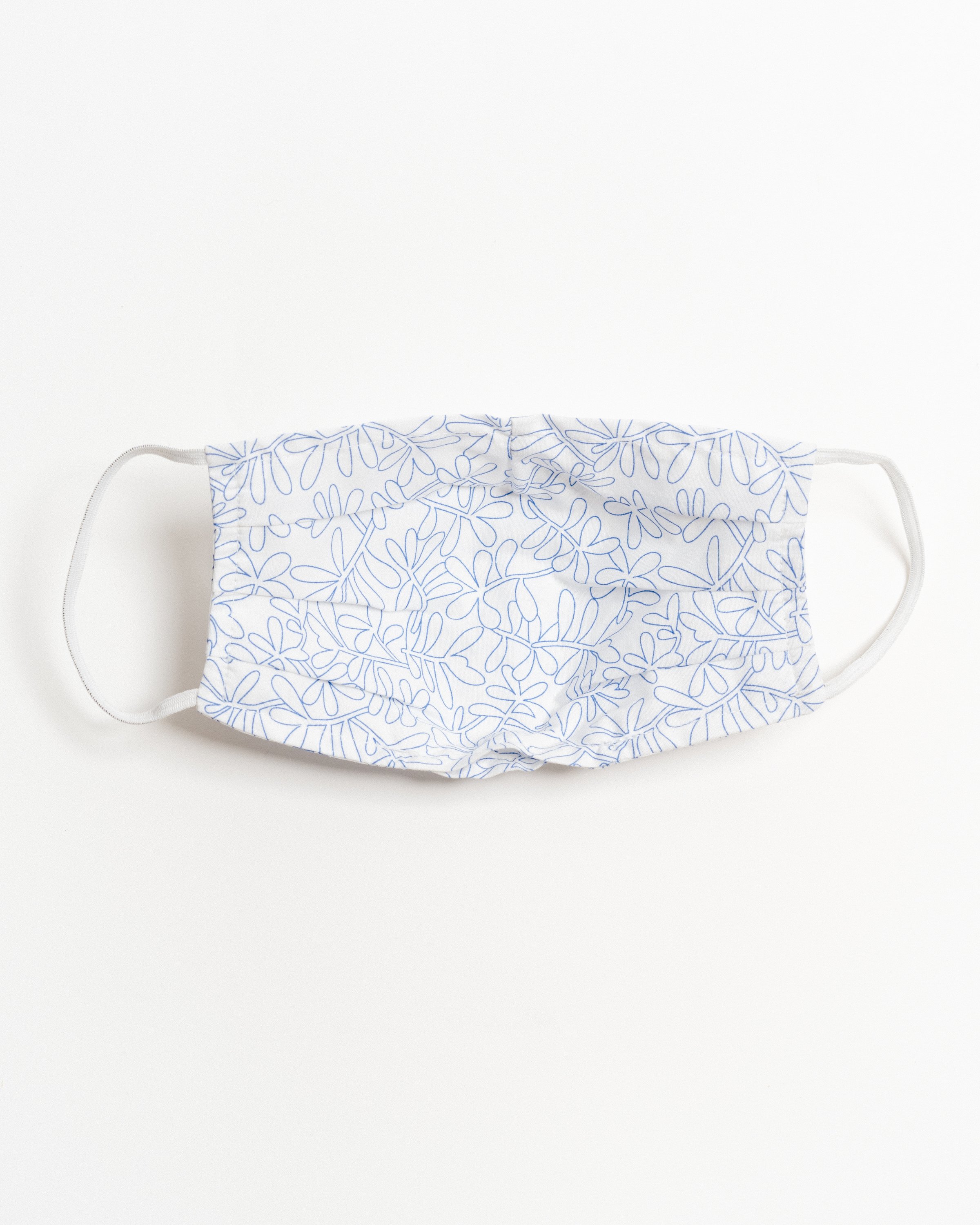 Silverlake Face Mask made of breathable cotton with pleats for comfort, featuring a pocket for filters and elastic ear straps.