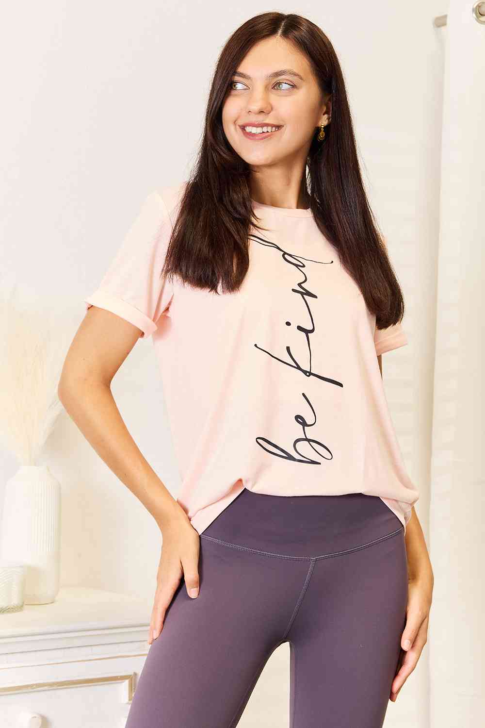 Simply Love BE KIND Graphic Round Neck T-Shirt featuring a stylish design with a positive message, made from a comfortable polyester blend.