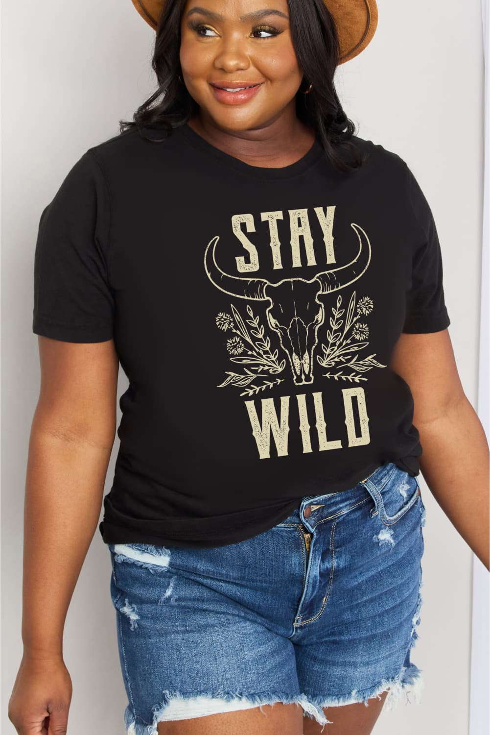 Simply Love Full Size STAY WILD Graphic Cotton Tee in casual style, featuring a round neck and short sleeves, made from 100% cotton.