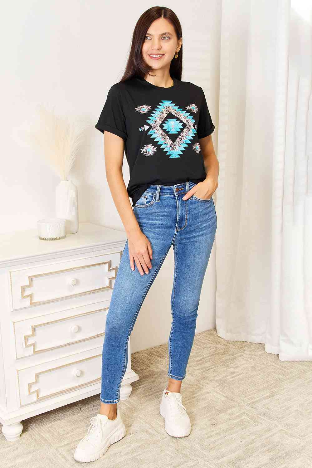 Simply Love Graphic Short Sleeve T-Shirt featuring a trendy graphic design, made from a comfortable polyester-spandex blend.