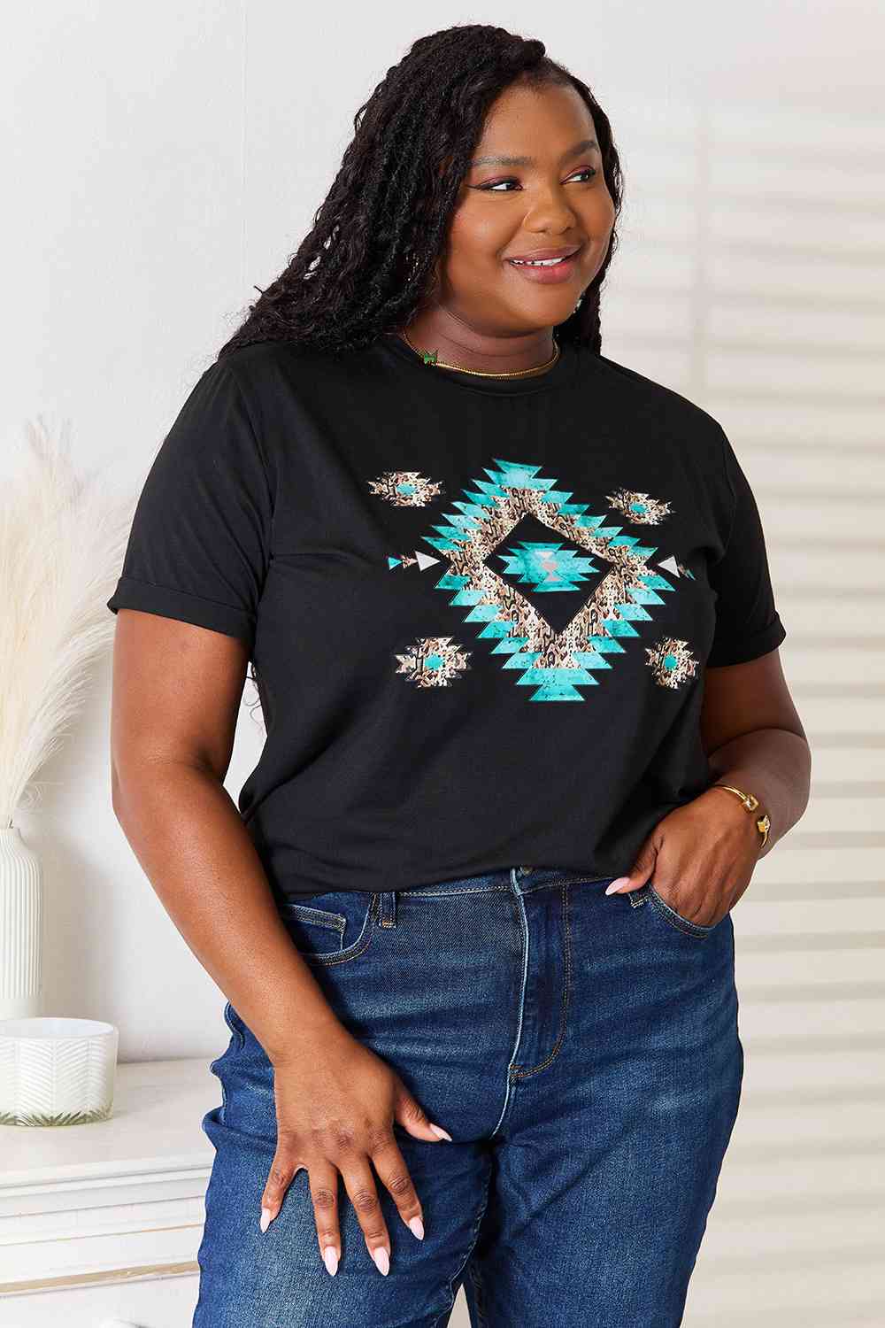 Simply Love Graphic Short Sleeve T-Shirt featuring a trendy graphic design, made from a comfortable polyester-spandex blend.