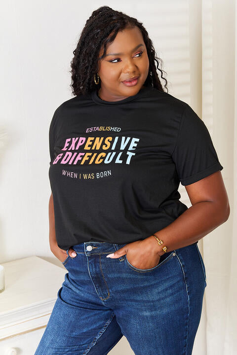 Simply Love Slogan Graphic Cuffed Sleeve T-Shirt featuring a bold slogan and cuffed sleeves, perfect for casual wear.