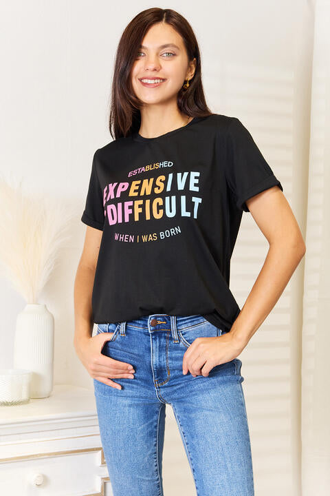 Simply Love Slogan Graphic Cuffed Sleeve T-Shirt featuring a bold slogan and cuffed sleeves, perfect for casual wear.