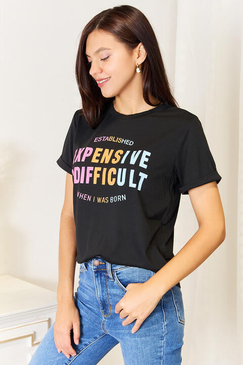 Simply Love Slogan Graphic Cuffed Sleeve T-Shirt featuring a bold slogan and cuffed sleeves, perfect for casual wear.