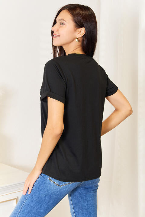 Simply Love Slogan Graphic Cuffed Sleeve T-Shirt featuring a bold slogan and cuffed sleeves, perfect for casual wear.