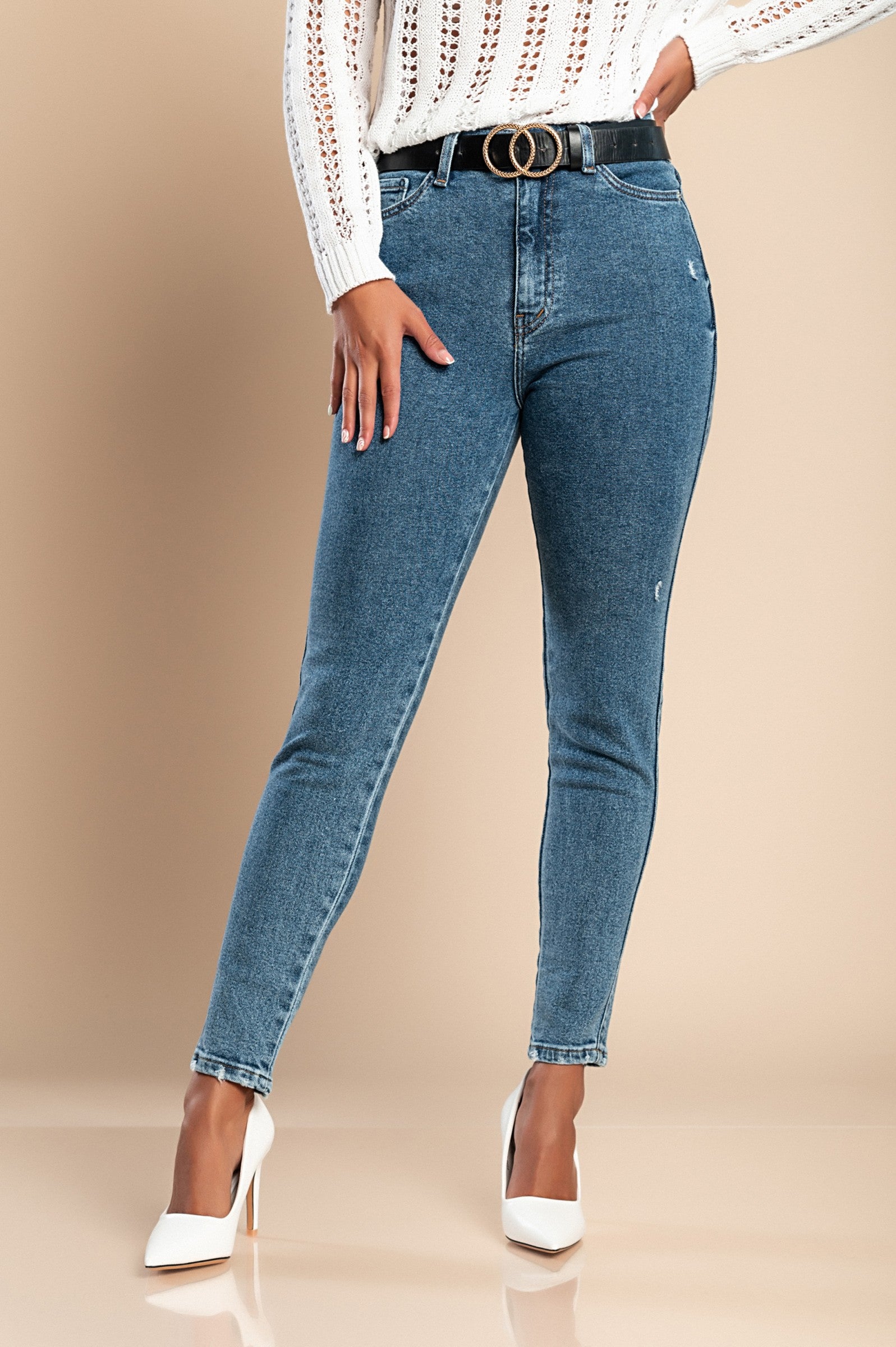 A pair of blue skinny stretch jeans featuring a tapered leg, front and back pockets, zip and button closure, made from high-quality cotton.