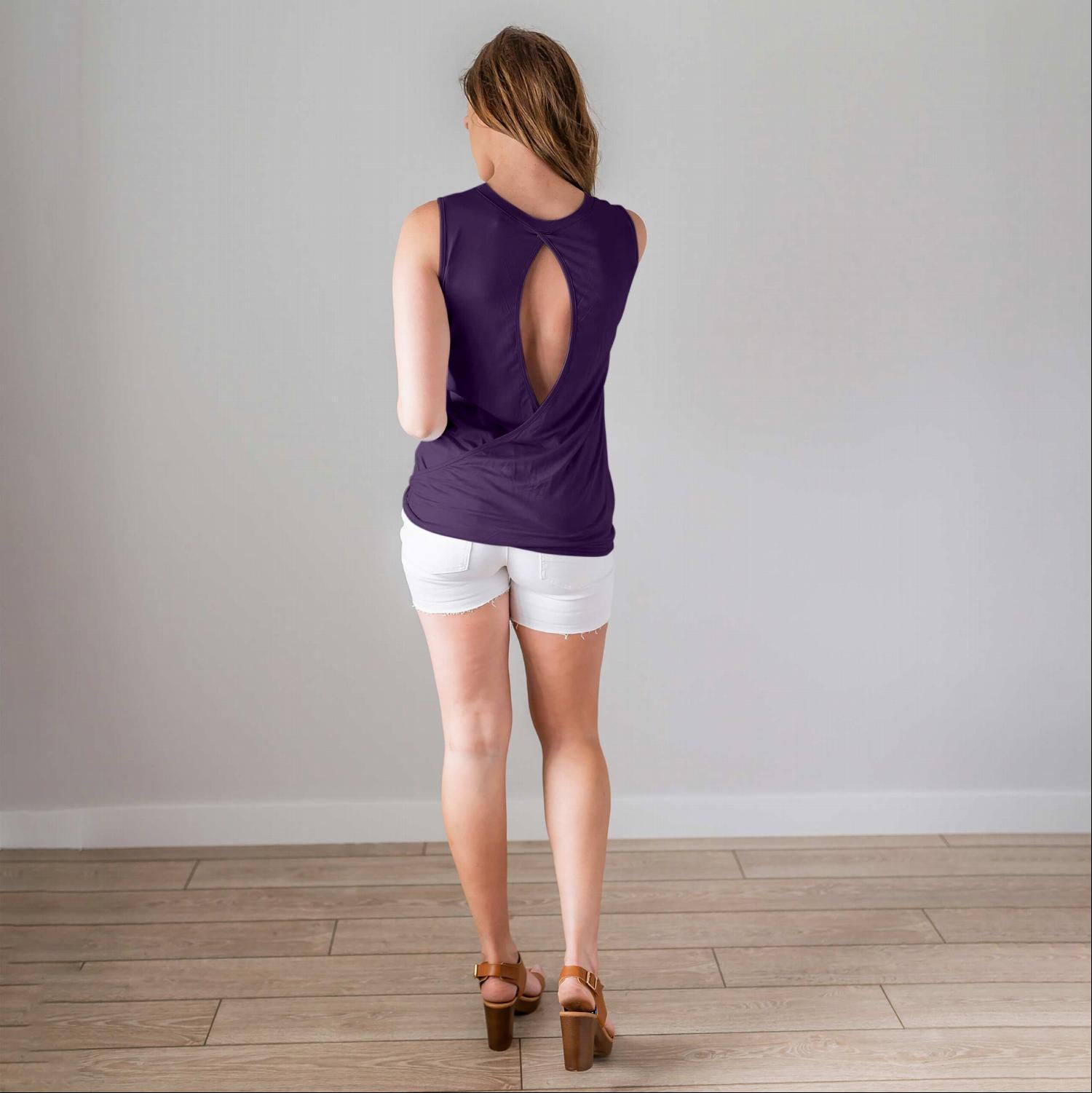 A stylish sleeveless top featuring a back keyhole design, perfect for warm weather and versatile styling options.