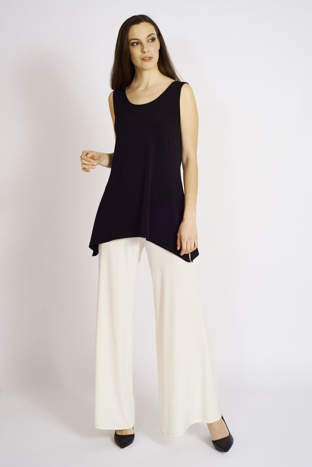 A stylish Slim Side Slit Tank featuring a scoop neck and side slits, made from soft stretch knit jersey, perfect for casual or chic outfits.