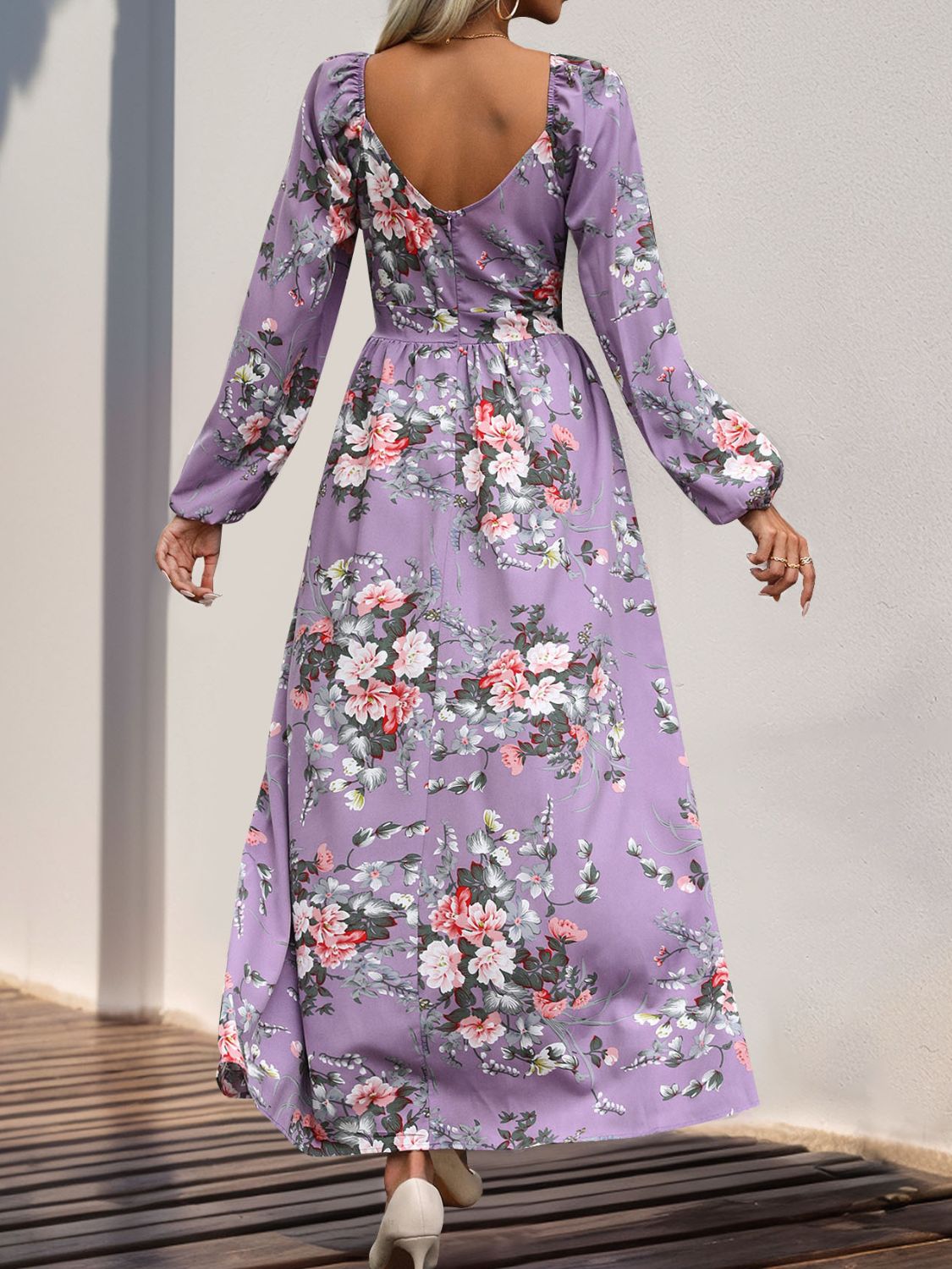 A stylish Slit Printed Surplice Long Sleeve Maxi Dress featuring a slit design, long sleeves, and a flattering silhouette, perfect for various occasions.