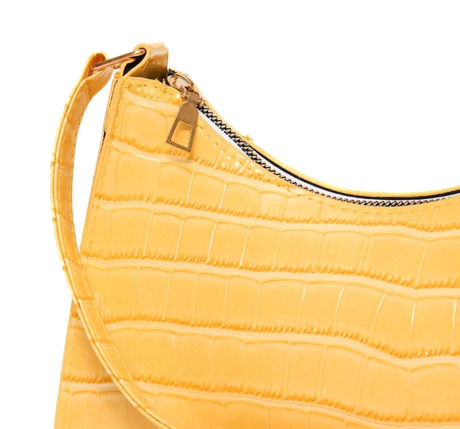 Stylish yellow small bag with crocodile print design made of high-quality faux leather.