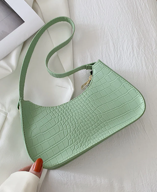 Stylish mint crocodile print small bag made of high-quality faux leather, featuring a compact design and elegant texture.