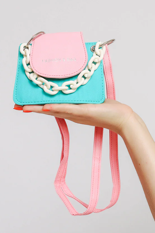 Small blue-pink bag ART2278 with decorative chain, made of high-quality faux leather.