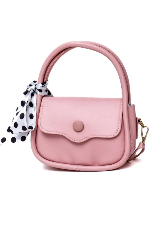 Elegant small pink bag with decorative bow, made of high-quality faux leather, featuring a snap button closure.