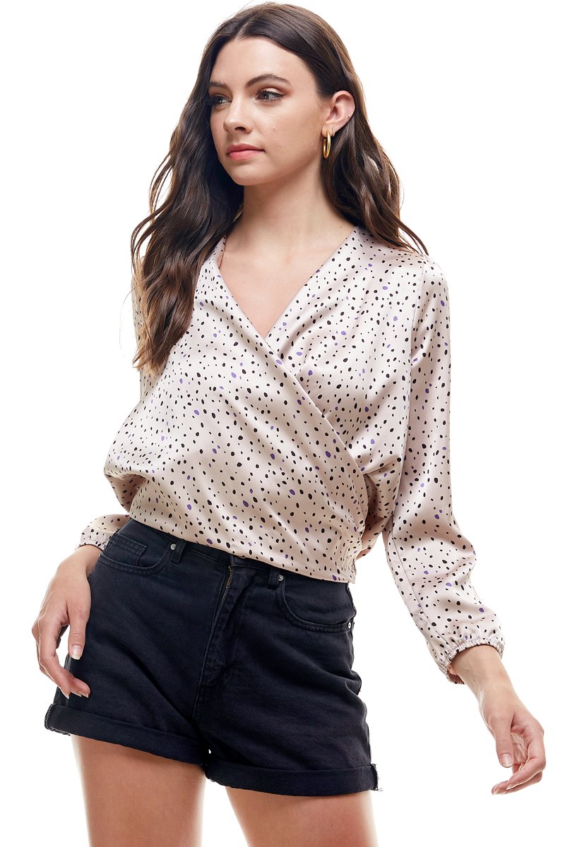 A stylish Small Dot Printed Surplice Wrap Blouse Top featuring a playful dot pattern, perfect for various occasions.