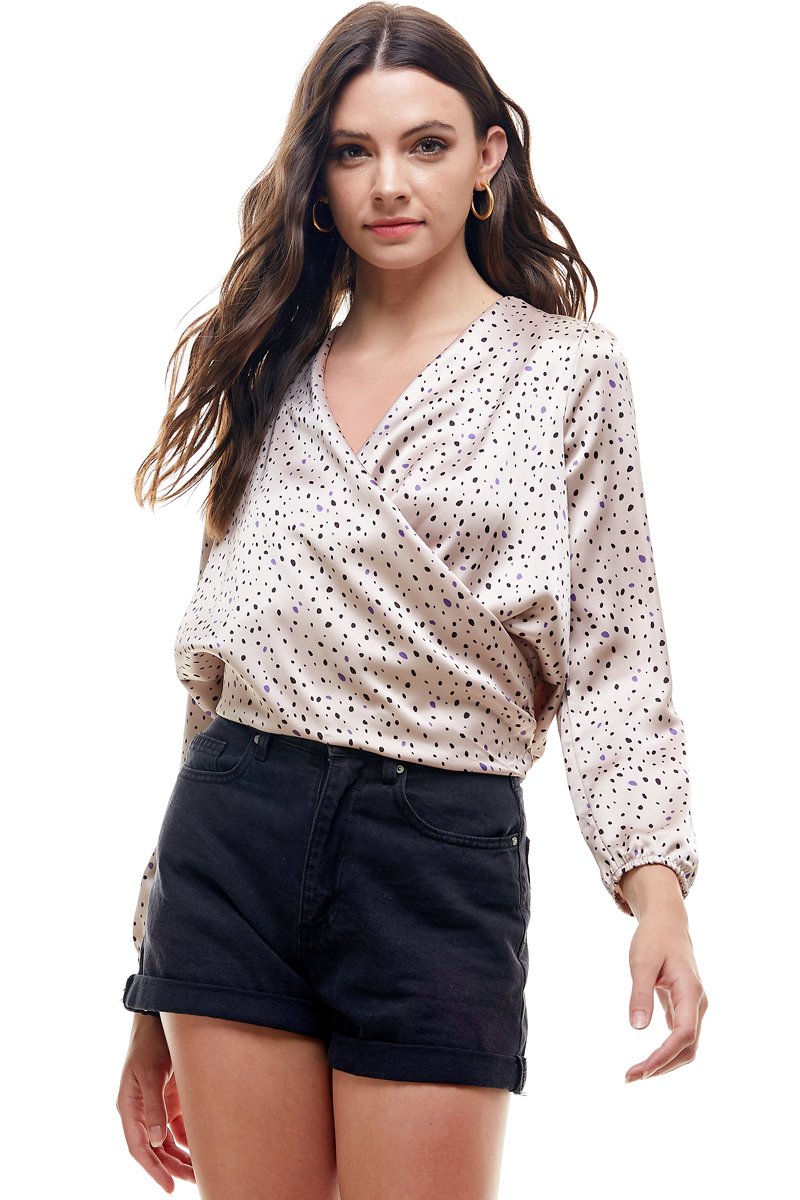 A stylish Small Dot Printed Surplice Wrap Blouse Top featuring a playful dot pattern, perfect for various occasions.