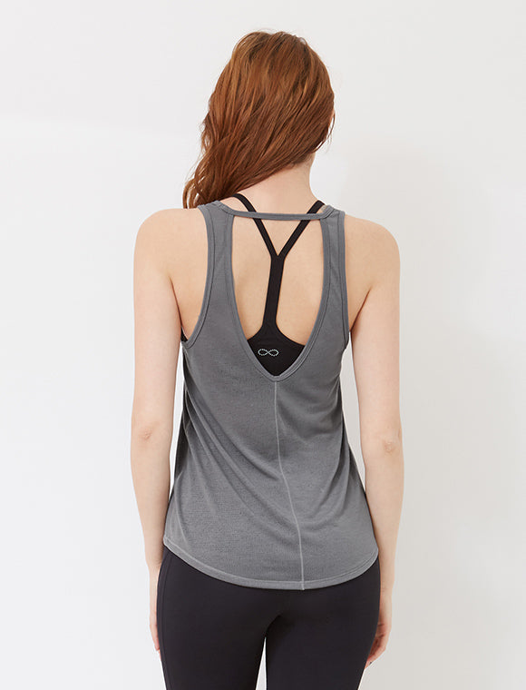 A stylish Small Talk Burnout Tank featuring an open back cut-out design, made from lightweight and breathable fabric, perfect for workouts.