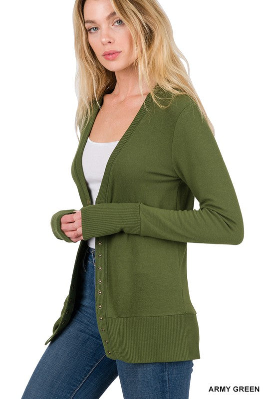 A stylish snap button sweater cardigan featuring ribbed details at the neckline, bottom, and sleeves, perfect for layering.