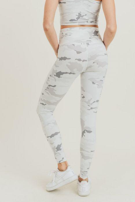 A pair of full-length Snow Camo Highwaist Leggings featuring a high waistband and discreet pouch, designed for comfort and style.