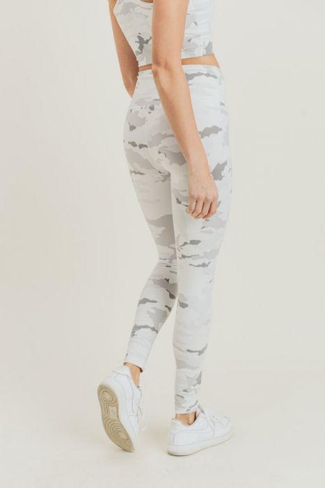 A pair of full-length Snow Camo Highwaist Leggings featuring a high waistband and discreet pouch, designed for comfort and style.